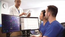 Medical professionals in a discussion. 