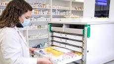 Pharmacist sorting medication Pharmacist sorting medication