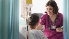 Healthcare worker talking to patient Healthcare worker talking to patient