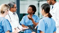 Group of healthcare workers talking Group of healthcare workers talking