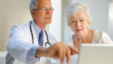 Doctor and patient with EHR