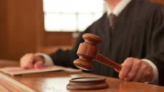 Judge holding gavel Judge holding gavel