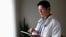 Doctor holding tablet Doctor holding tablet