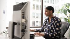 Woman at desktop computer