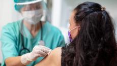 Nurse administers COVID-19 vaccine