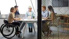 A diverse set of colleagues in a board meeting A diverse set of colleagues in a board meeting